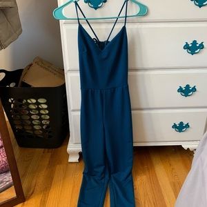 Blue jumpsuit with open back